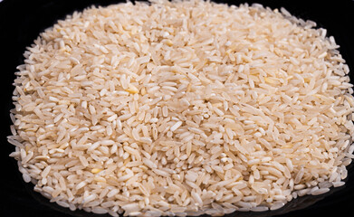 rice (Pachari) on black background
