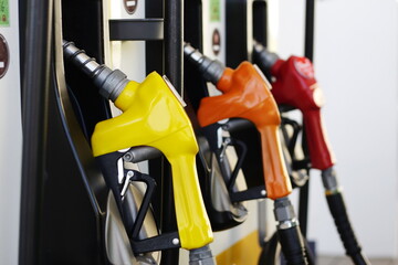 Petrol pump filling fuel nozzle in a gas station.Service at the Gas Station.	