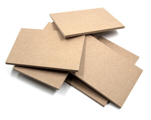 Multiple boards of raw mdf, the material used to make room doors.