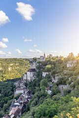 Fototapeta na wymiar View of the famous Rocamadour castle on top of the cliff in Lot, Occitania, Southwestern France (vertical photo)