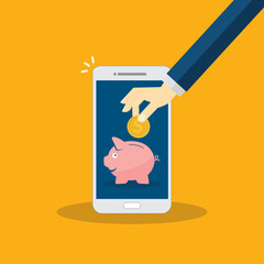 Donate, donation concept. Human hand with gold coin and piggy bank on mobile phone.