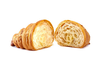 Plain Croissant cut in half, showing the cross section, a classic crescent-shaped croissant. isolated on a white background.