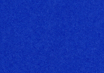 High detail uncoated bright dark royal blue paper texture background close-up scan with rough fiber...