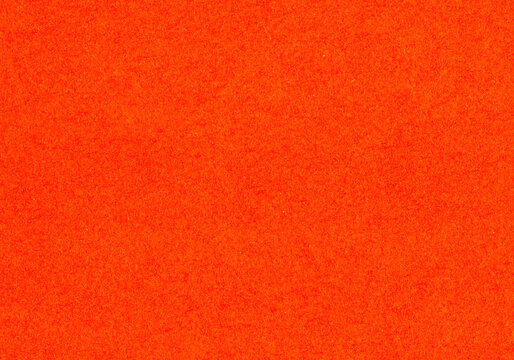 High quality close up scan of an fine grain fiber smooth uncoated paper texture red, bright, neon orange colored background with copy space for text material mock up for wallpapers