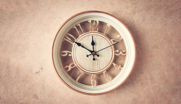 Mechanical wall clock, transparent , beige color , on a light painted wall, rustic style, vintage, no people,