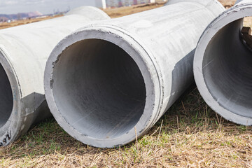 Water pipes for drinking water supply lie on the construction site. Preparation for earthworks for...