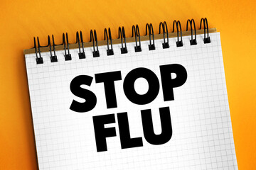 Stop Flu text on notepad, concept background