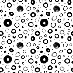 Hand drawn grunge circles seamless pattern. Different kind of circles, bold and thin, big and small. Geometric modern graphic design. Hand drawn polka dot vector pattern. Memphis style background