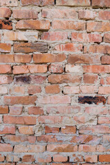 Red brick wall, close-up, brickwork background. Old building materials