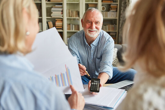 Senior in a financial consultation about a savings plan