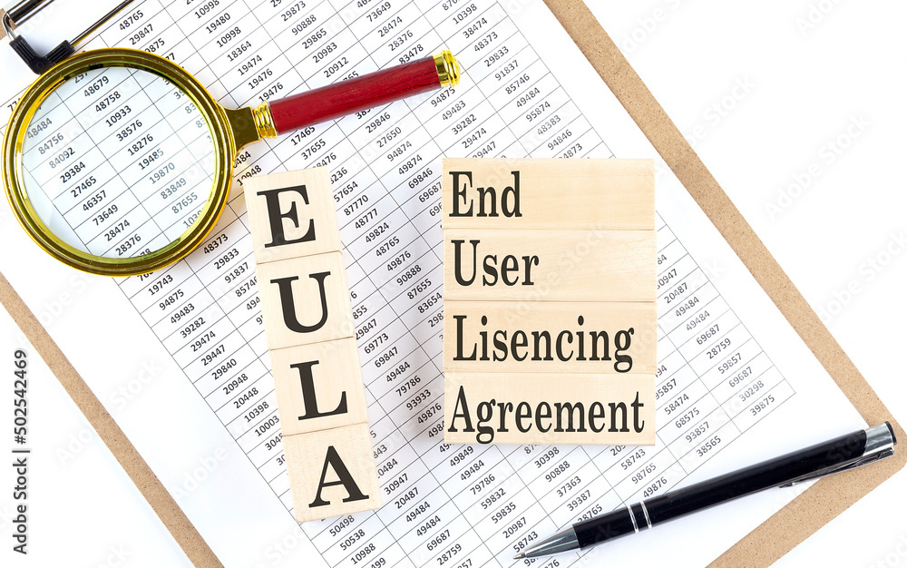 Poster eula - end user licensing agreement text on wooden block on chart background