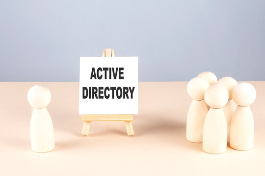 ACTIVE DIRECTORY text on easel with wooden figure, meeting concept