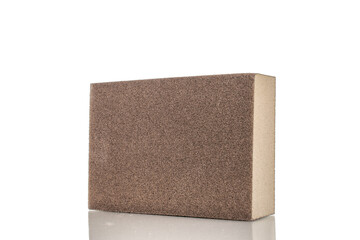 One sanding block, close-up, isolated on a white background.