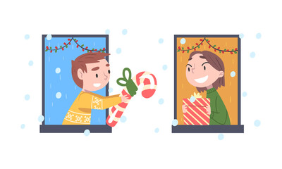 Cute Little Boy and Girl Looking out of Window Giving or Receiving Christmas Gift