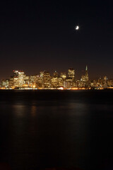 Fototapeta na wymiar the skyline of San Francisco and moon at night