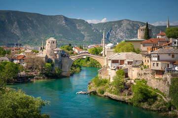 View of Mostar at a sunny summer day - obrazy, fototapety, plakaty