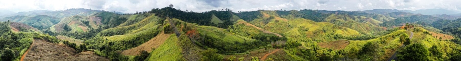 Fototapeta premium Aerial view of Curvy road number 3 in the mountain of Pua district, Nan province, Thailand