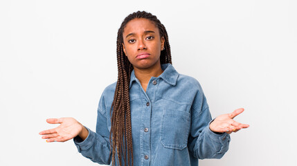 afro pretty woman feeling puzzled and confused, unsure about the correct answer or decision, trying...