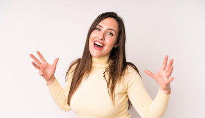 young adult pretty woman looking happy, arrogant, proud and self satisfied, feeling like a number...