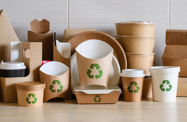 The concept of zero waste and recycling. Use of eco-friendly paper tableware and packaging made...