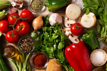 Background assortment of vegetables, herbs and spices