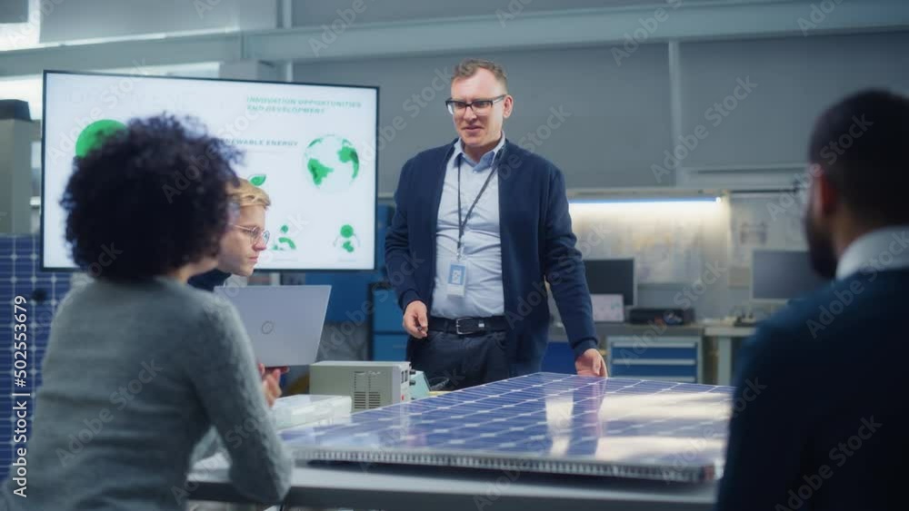 Poster team meeting of renewable energy engineers working on an innovative more efficient solar panel batte