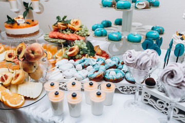 Delicious sweet buffet with cupcakes. Sweet holiday buffet with cupcakes and other desserts. Candy Bar.