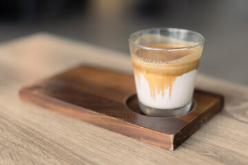 milk coffee, dirty coffee on the table
