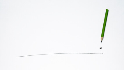 An underline and an exclamation mark are drawn on a piece of paper. Graphite pencil. copy space.