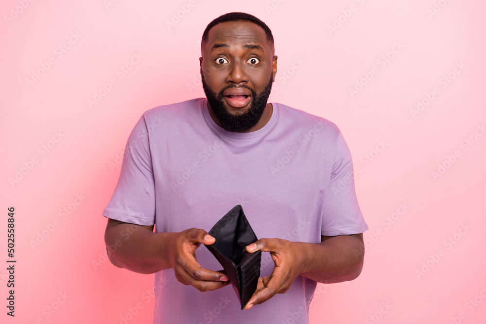 Wall mural Photo of shocked impressed guy dressed violet t-shirt lost work no salary isolated pink color background - Wall murals