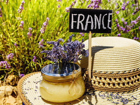 Jar with honey at lavender field. Holidays in France.