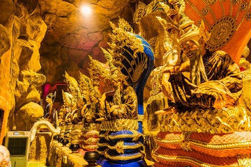 Nakhon Nayok, Thailand - April, 24, 2022 : Angel statue of Maniwong Temple at Nakhon Nayok, Thailand.Naga Cave is enshrines a large Buddha for people to worship.