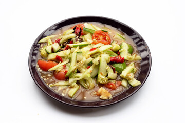 Spicy cucumber salad in plate