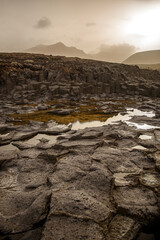 Obraz premium Volcanic rock black texture close up.