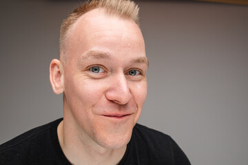 Copy-space photo of cheerful young man with big smile