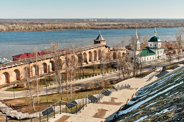 Fototapeta na wymiar Recreated Church of Simeon Stylite, White tower, walls of Nizhny Novgorod Kremlin and Volga River.