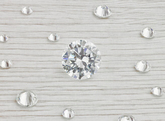 Loose Scattered Diamonds on White Wooden Background