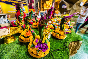 Nakhon Nayok, Thailand - April, 24, 2022 : Artificial Banana Leaf Work,head of great Naga at Nakhon Nayok, Thailand.Naga Cave is enshrines a large Buddha for people to worship. - obrazy, fototapety, plakaty