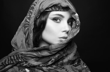 closeup portrait of beautiful young woman in veil