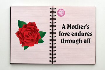 Happy Mother's day with quote written inside an open notebook. 