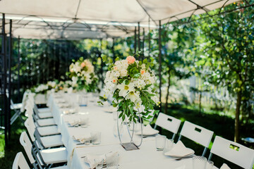 Wedding table. Fresh flower decorations for wedding ceremony