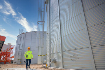 male engineer working in industrial estate Control, design and production management in the...