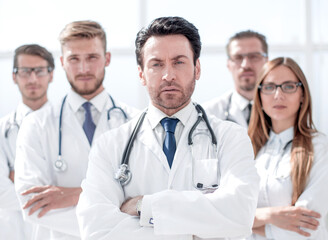 Fototapeta premium portrait of doctor and medical staff standing in the office