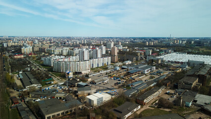 Fototapeta premium Large construction site. Construction of modern multi-storey residential buildings. Construction of apartment buildings from concrete and glass. Aerial photography.