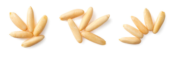 Shelled European pine nuts isolated on white background, top view.