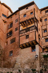 Fototapeta na wymiar Traditional house's facade of Albarracin. The typical houses on the cliff in Albarracin, Teruel, Aragón, Spain
