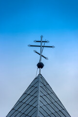 a cross on the top of traditional Ukrainian church in Skhidnytsa, Lviv region of Ukraine