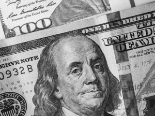 Part of the $100 close-up. US currency. Paper money. Cash. Dollar bills. A bundle of investments.