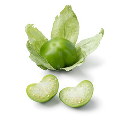 Single fresh green whole and halved tomatillo in a husk isolated on white background