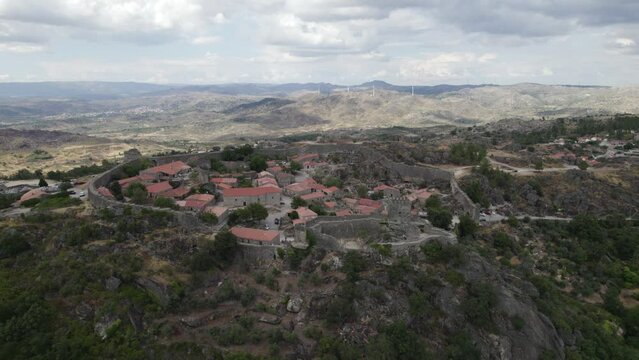 Approaching Sortelha historic medieval landmark and castle of Portugal. Aerial view
